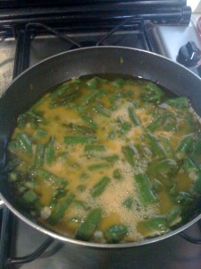 Adding the eggs to the asparagus