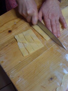 Cutting the pasta into strips...
