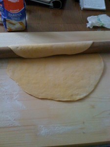 Marinella taught me that if you wrap the dough around the pin and drag it toward you, it helps roll it out.  And is just looks cool!